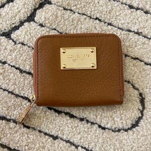 Michael Kors tan leather wallet with gold accents